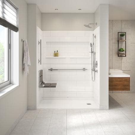 A bathroom with white walls and tile floors.